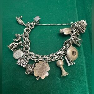 Rythym Sterling Silver Charm Bracelet with Unique Charms